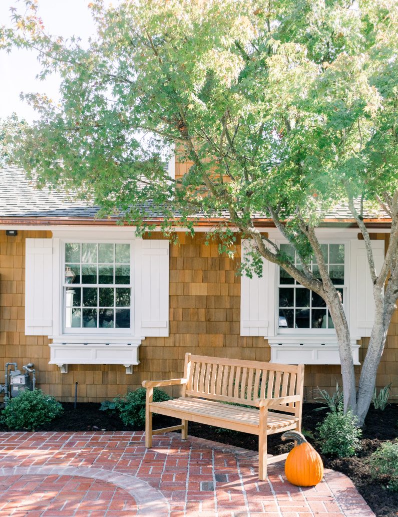 Driveway bench with pumpkin