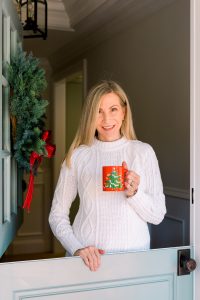 Woman standing in Dutch doorway