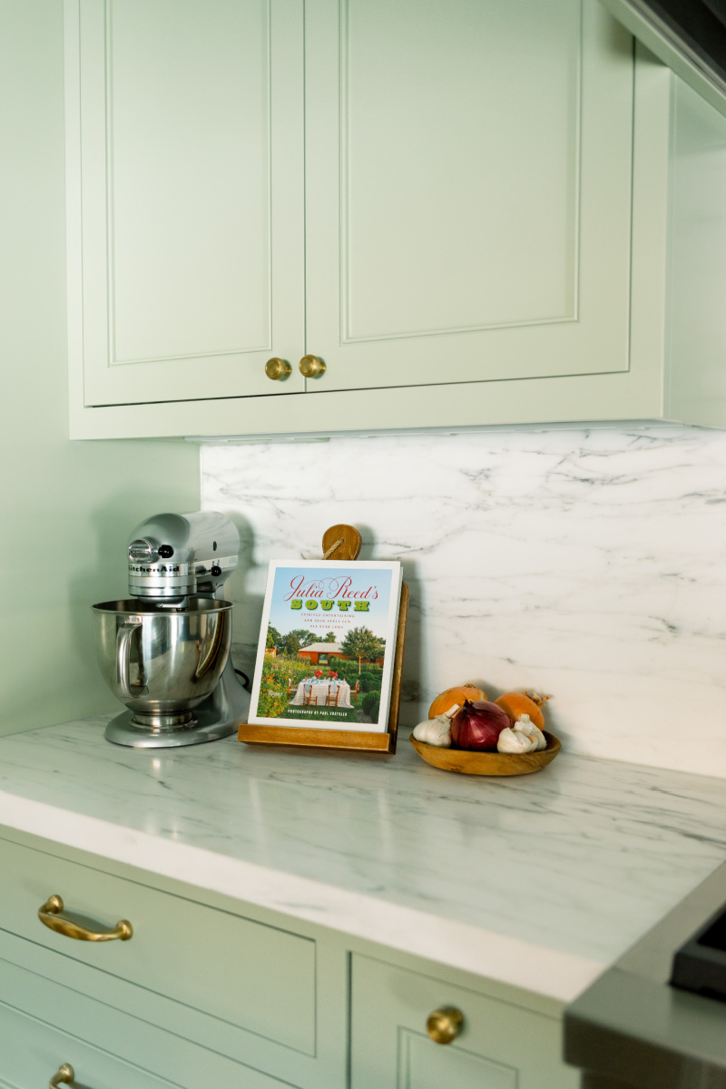 Kitchen Aid Mixer Cookbook and vegetable bowl