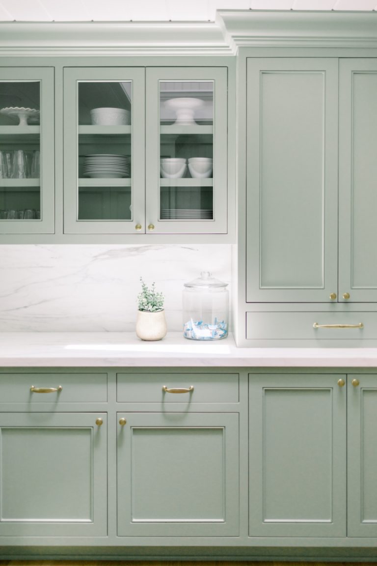 Sage Kitchen Cabinets with Glass Fronts