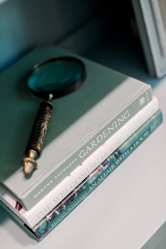 Coffee Table Books and magnifying glass