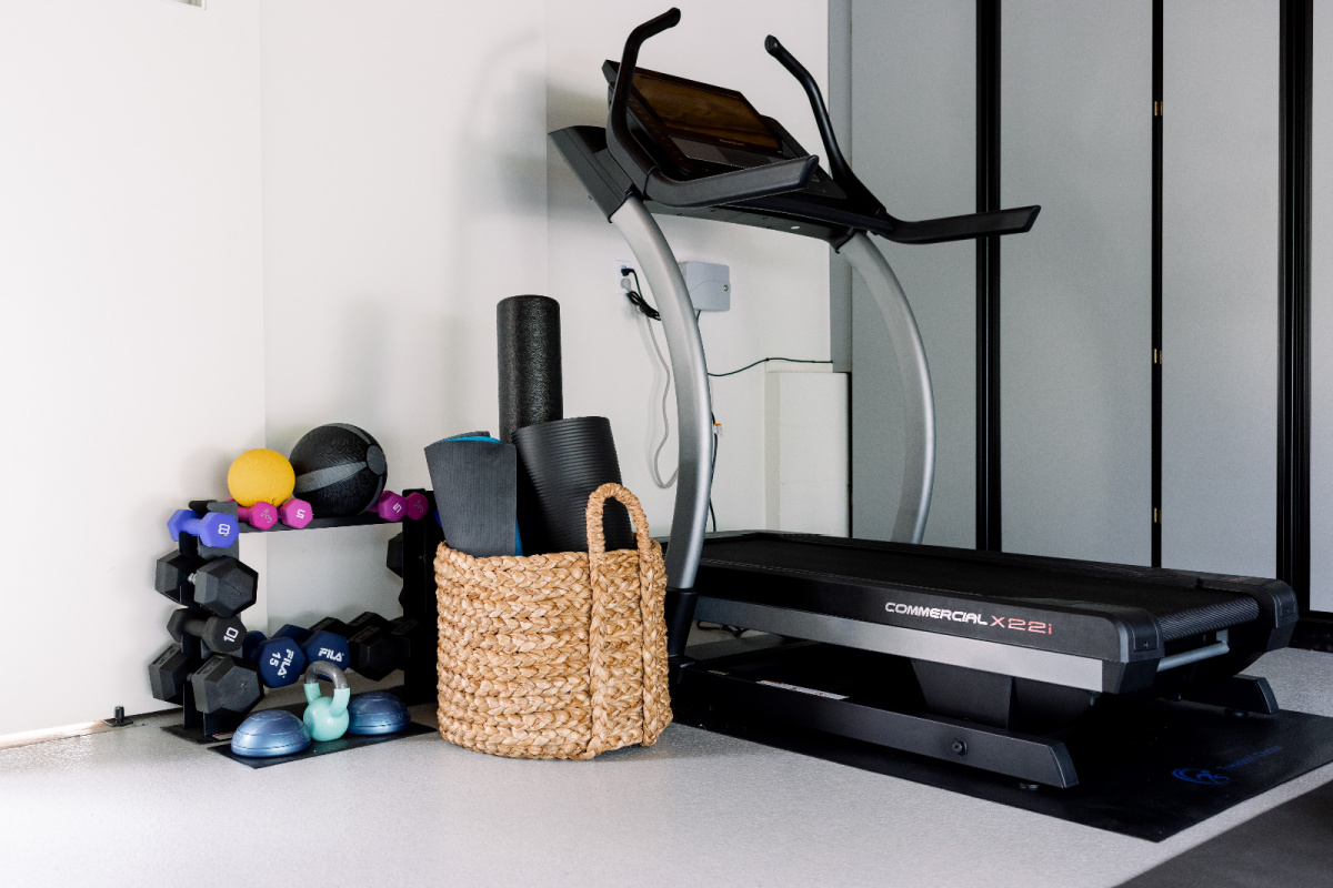 Treadmill, weight rack and gym equipment