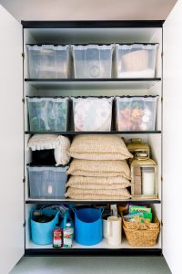 Seasonal and fall decor on garage storages shelves