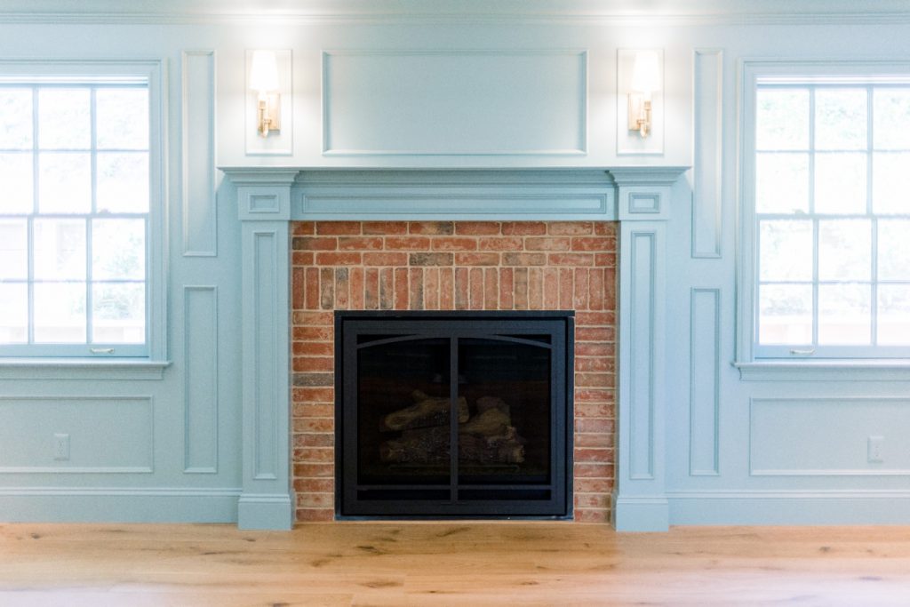 Home Library Fireplace and Sconces