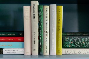 Books between duck bookends on shelf