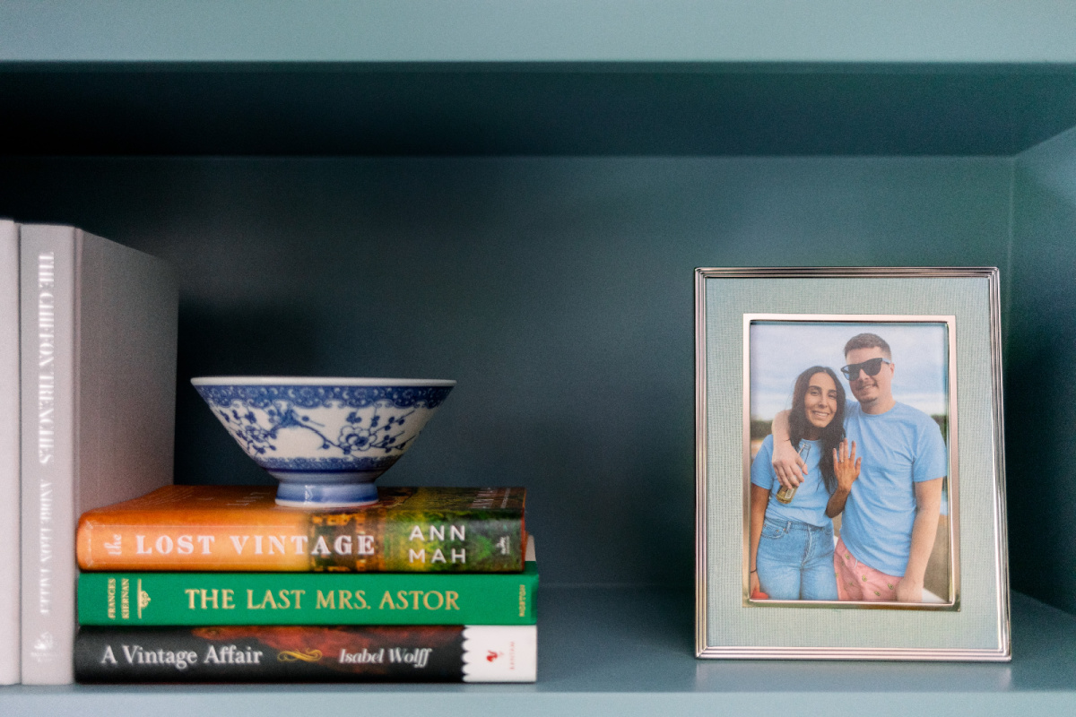 Books and photo on bookshelf