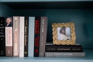 Books and photos on shelf