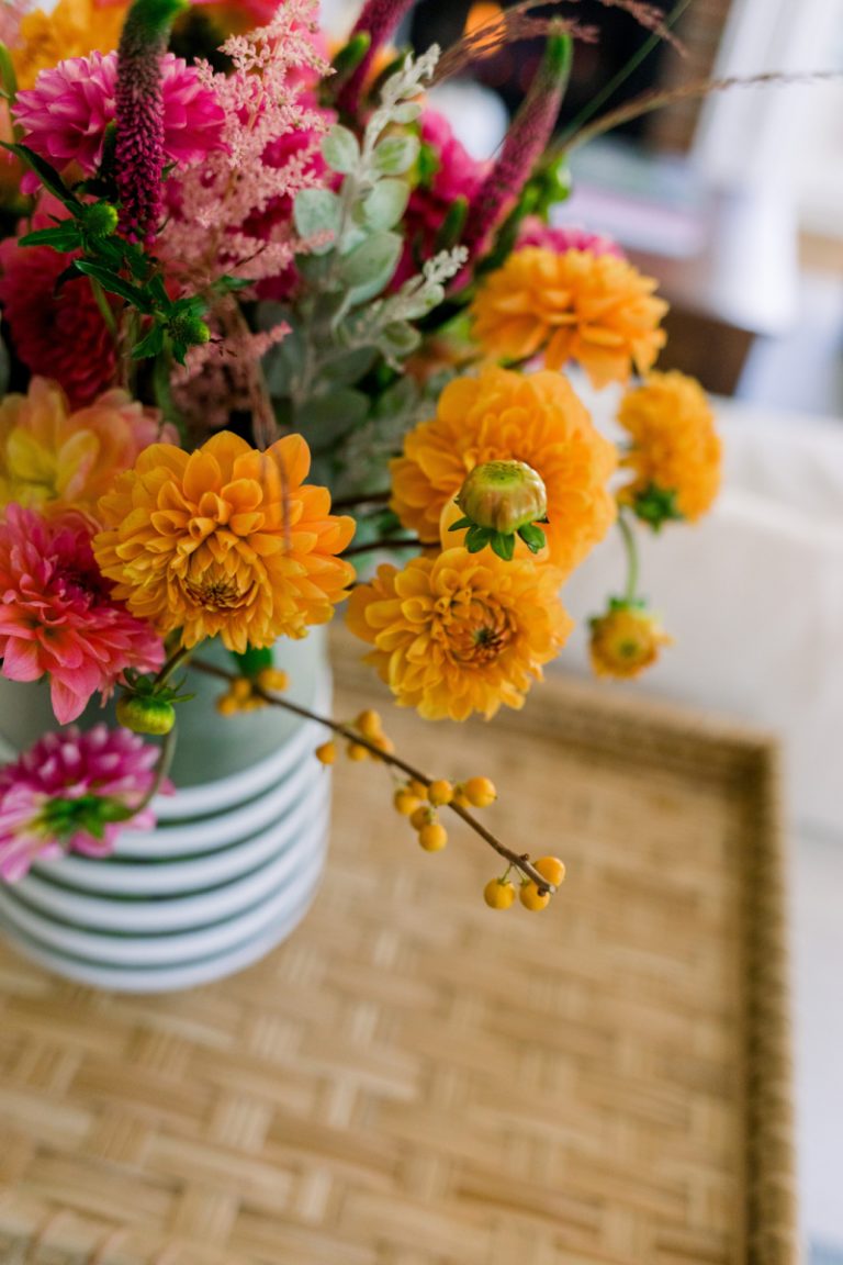 Floral arrangement on rattan table