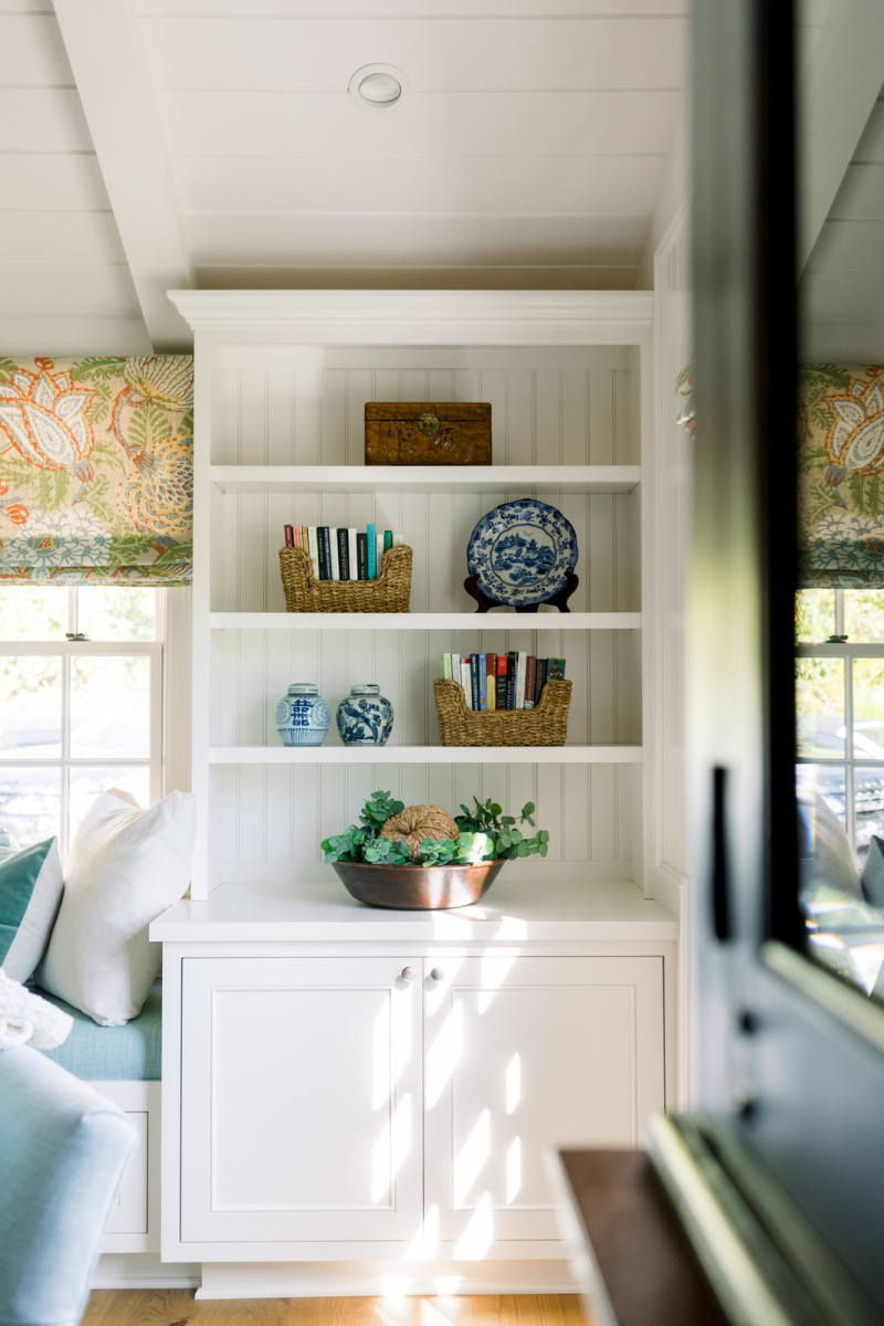 Great room shelves decorated for fall