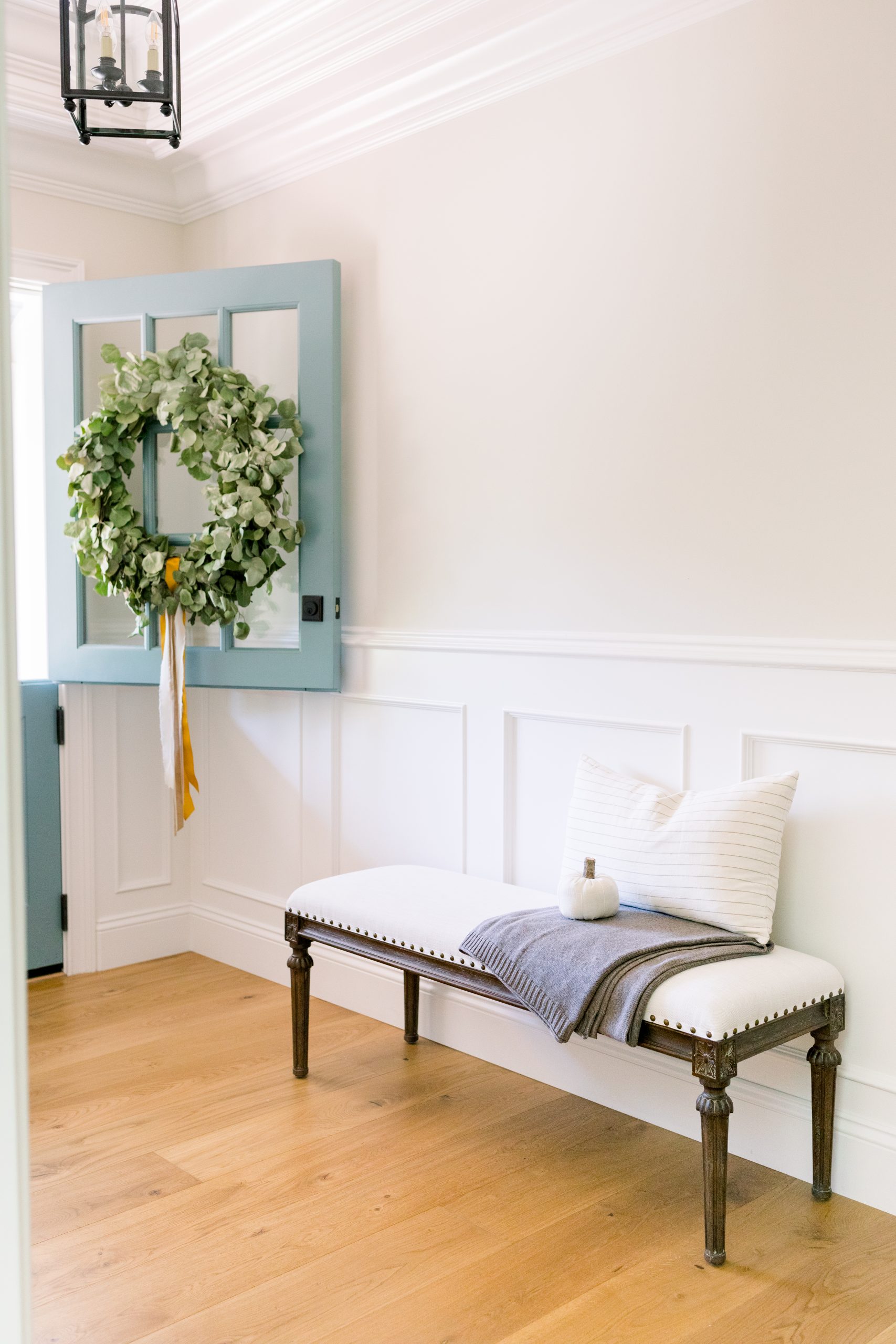 Foyer bench, wreath on Dutch door