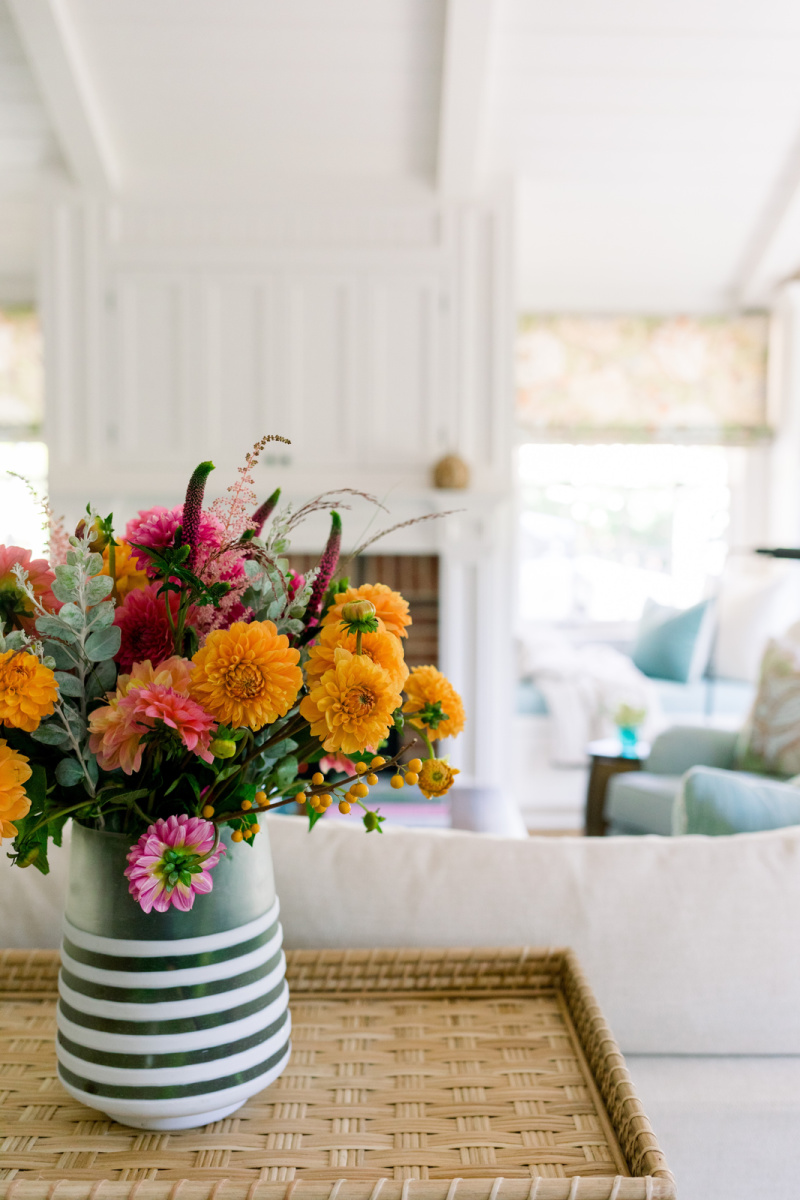 Looking into great room with flower arrangement and window seat