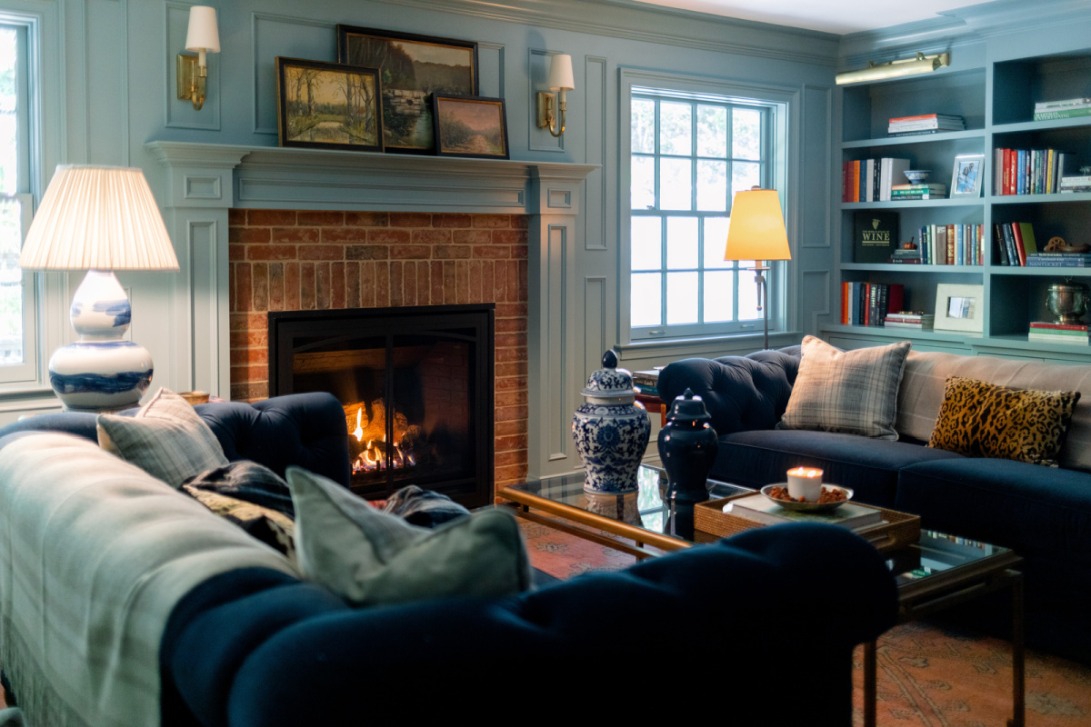 Library sofas, ginger jars, fireplace