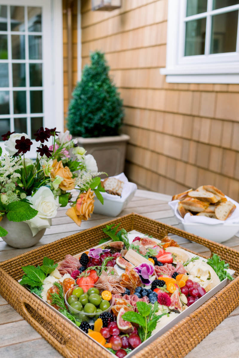 Charcuterie board on outdoor table