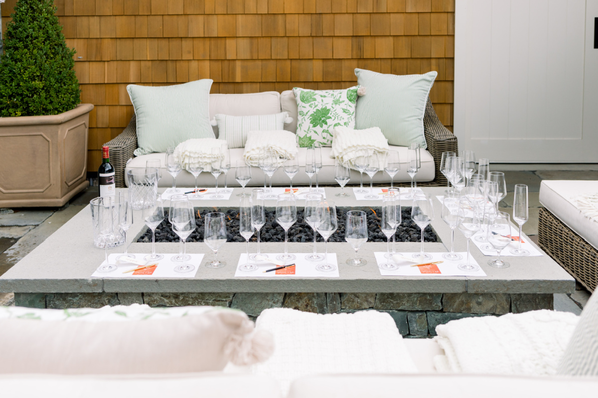 Wine tasting set up around patio firepit