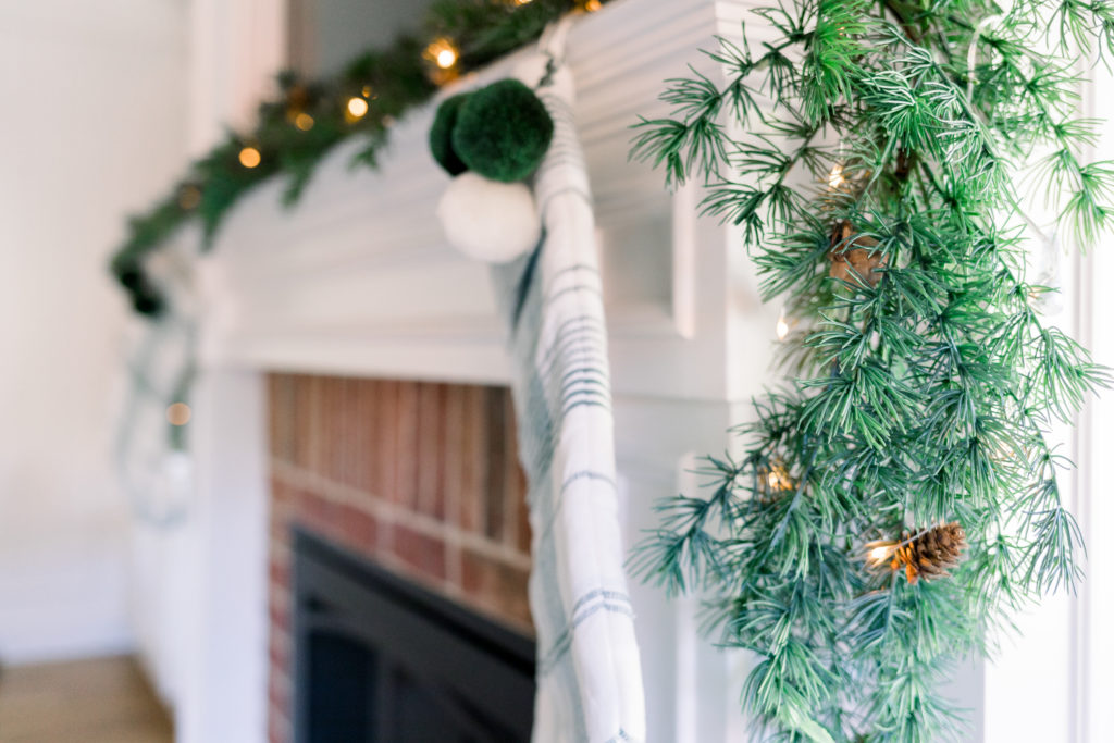 Mantle with greenery and stocking