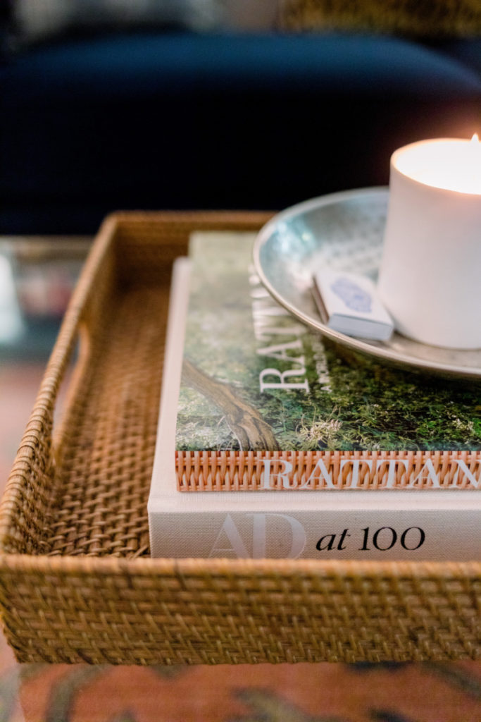 Coffee table books in basket tray