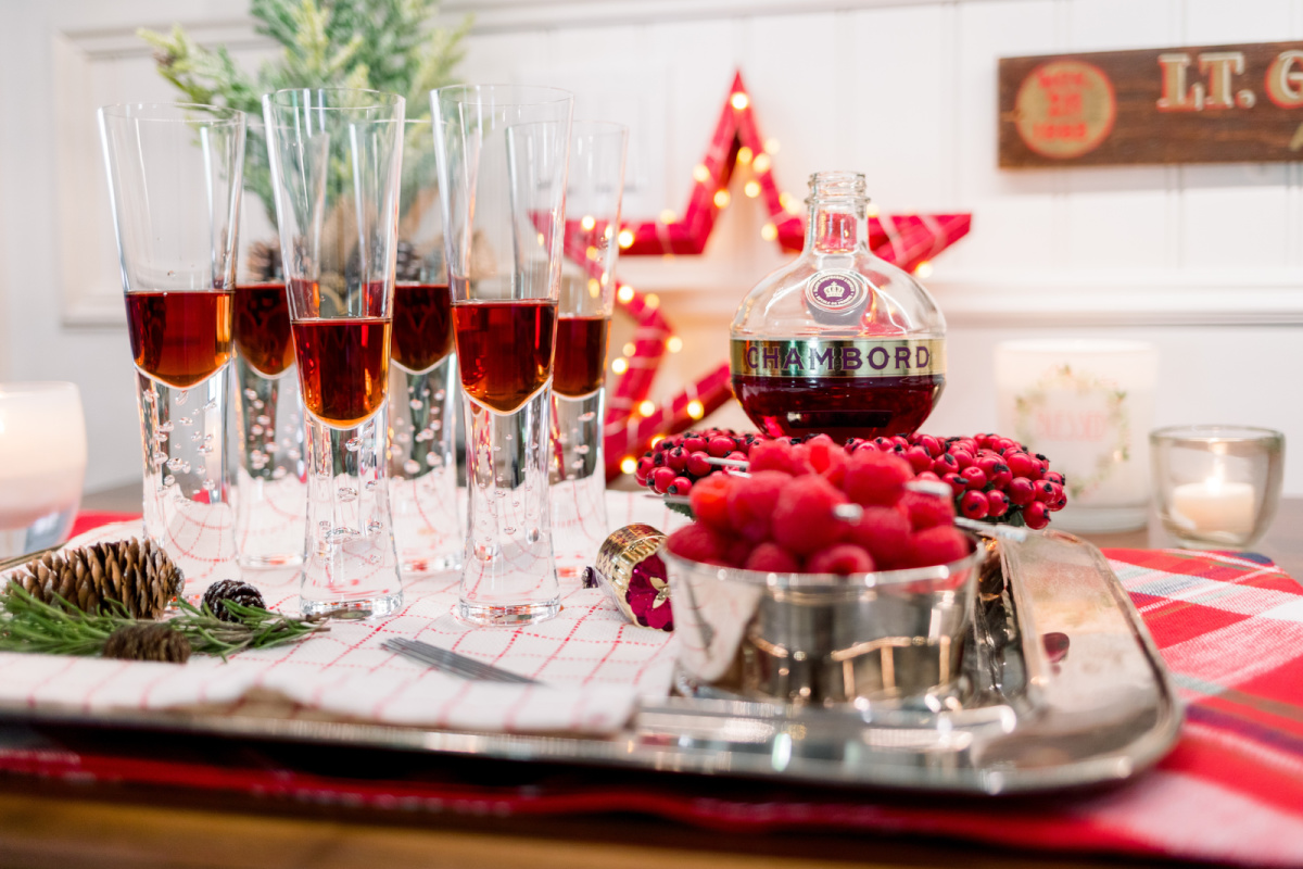 Champange glasses on tray filled with Chambord