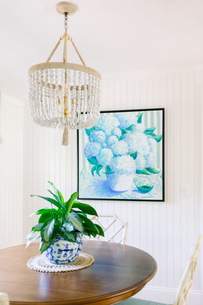 Dining room chandelier and art