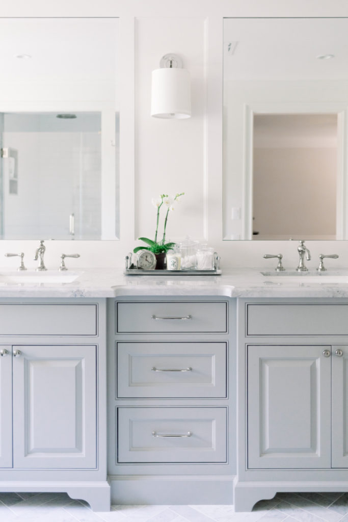 Bathroom vanity and sconce
