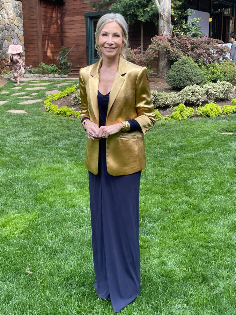 Mother of the Groom standing in the garden