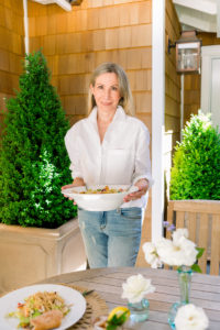 Woman serving salad