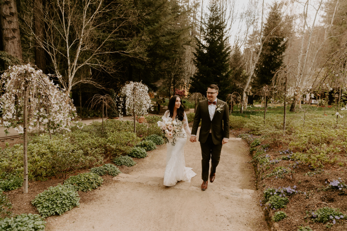 Bride and Groom walking up path