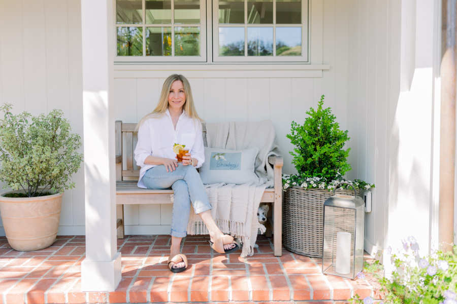 woman on front porch bench