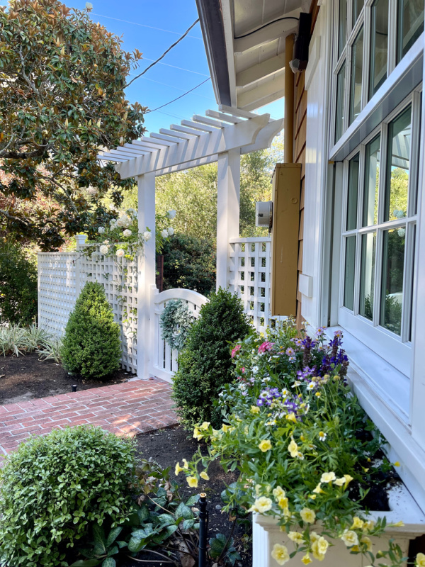 Front of house window boxes and arbor