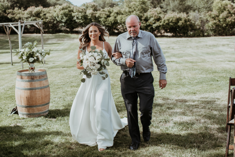 Bride and her dad coming down the aisle