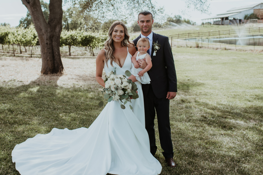 Bride, Groom and Baby