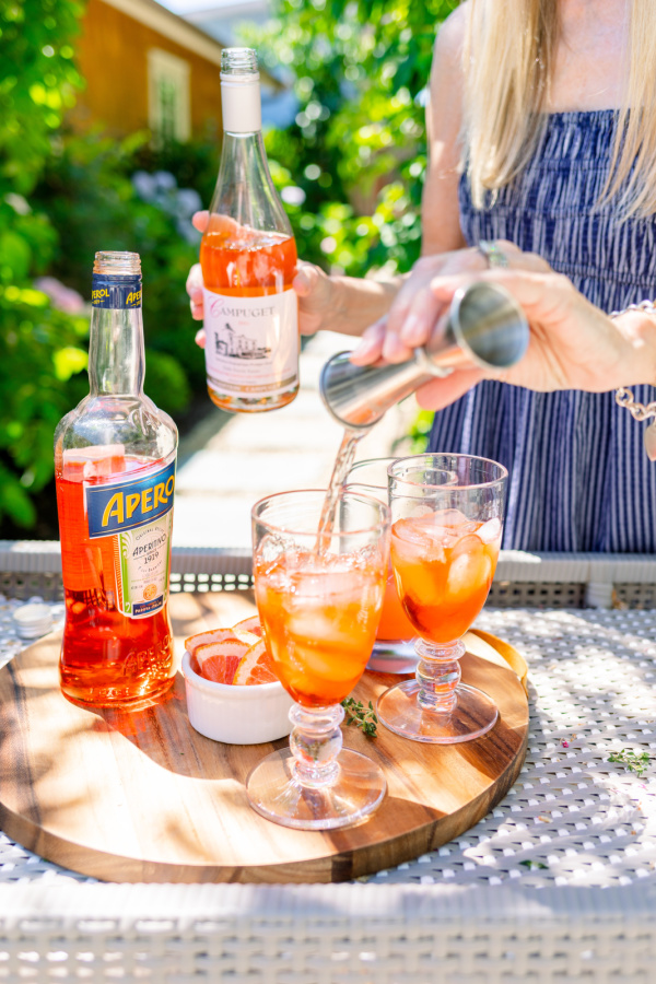 Adding Prosecco to glass