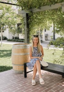 Woman sitting on bench in Sonoma