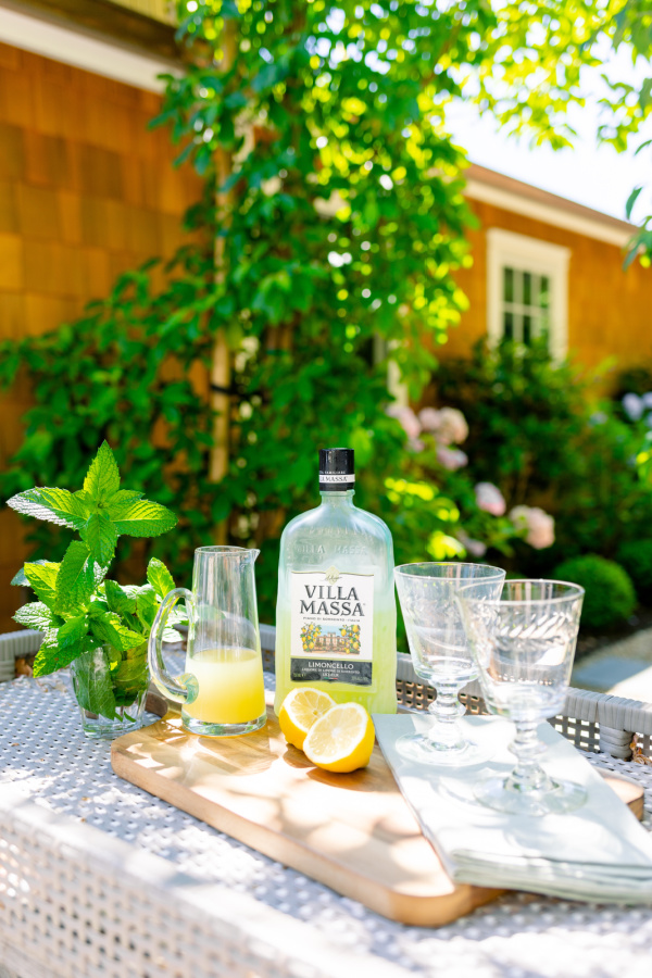 Limoncello Spritz ingredients on outdoor bar