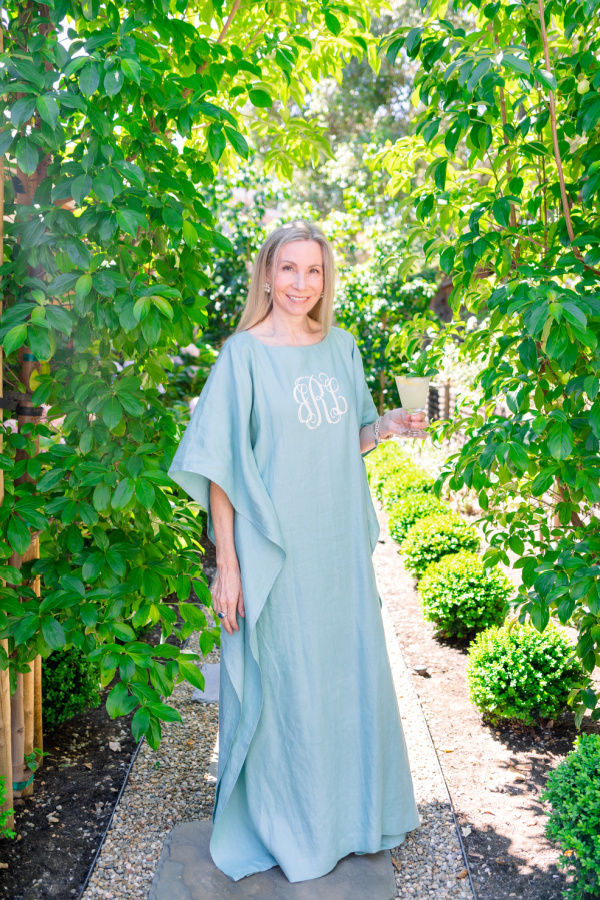 Woman wearing caftan in the garden