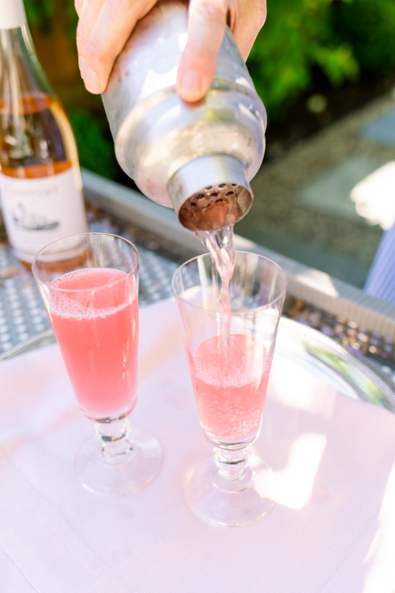 Pouring cocktail into glasses