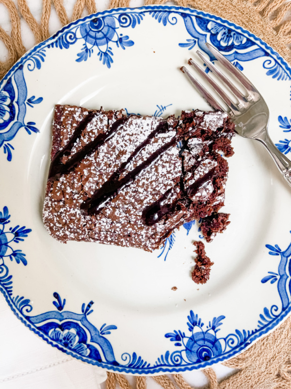Brownie on blue and white plate.
