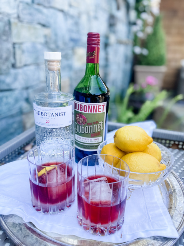 Debonnet Cocktails on tray in garden.