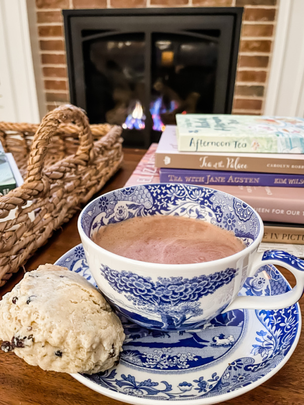 Cup of cocoa and currant scone.