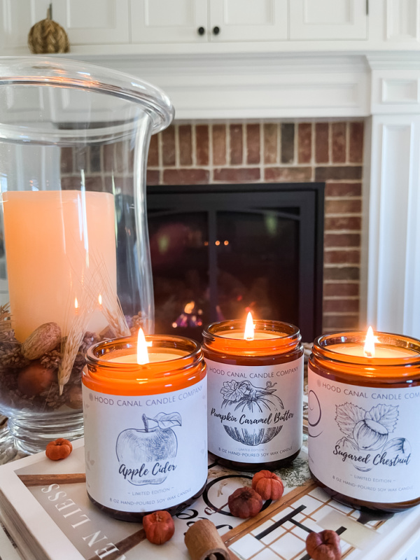 Hood Canal Candles in front of fireplace.