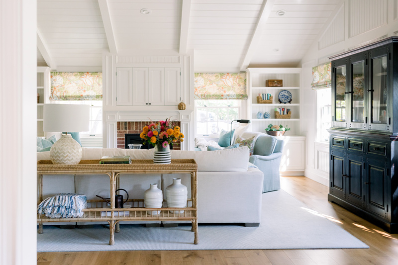 View into great room, console table behind sectional.
