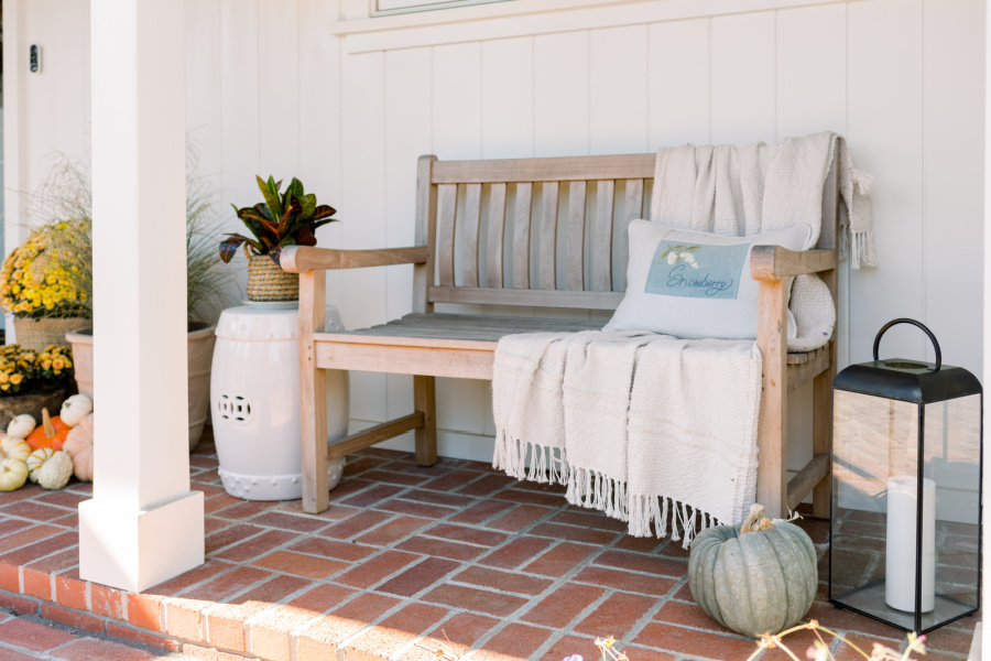 Front porch decorated for fall