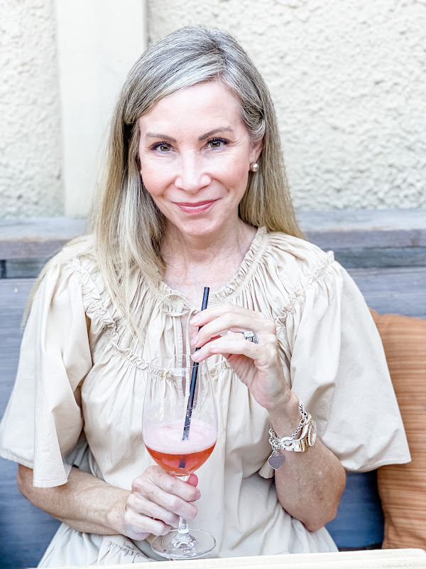 woman drinking froze with a straw.