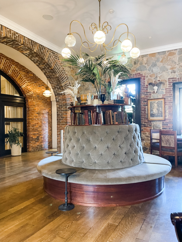 Holbrooke Hotel lobby green banquette.