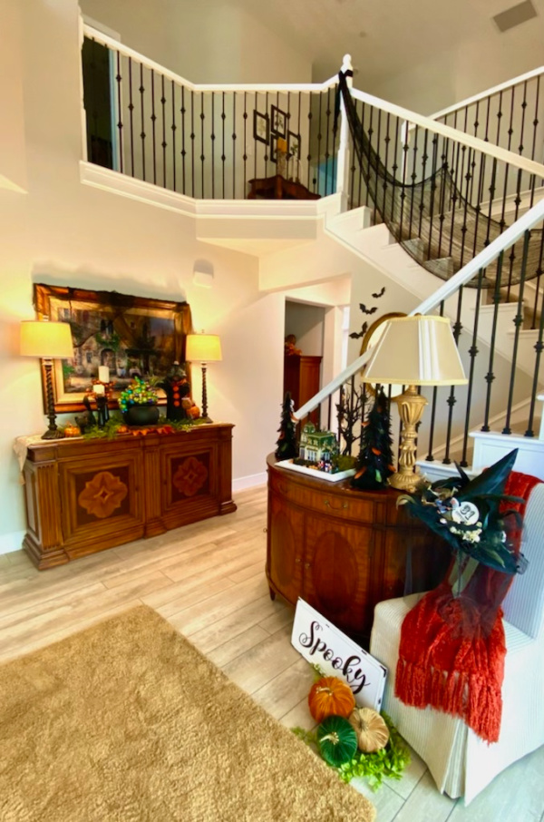 Two story entry way decorated for Halloween.