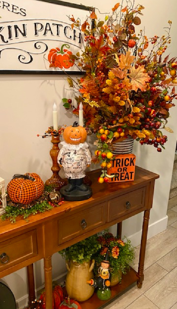 console table decorated for Halloween.