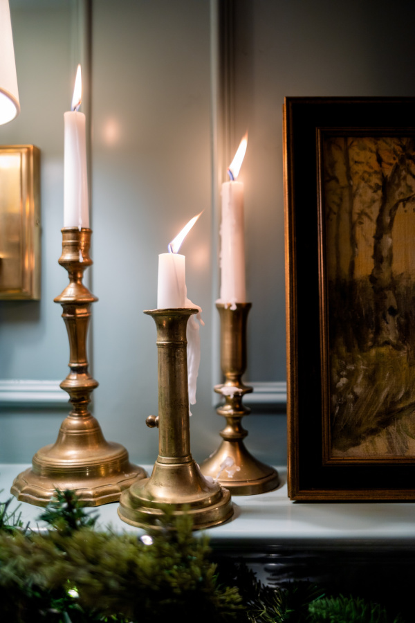 Brass Candlesticks on mantle.