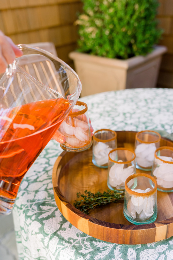 Making Apple Cider Aperol Spritz.