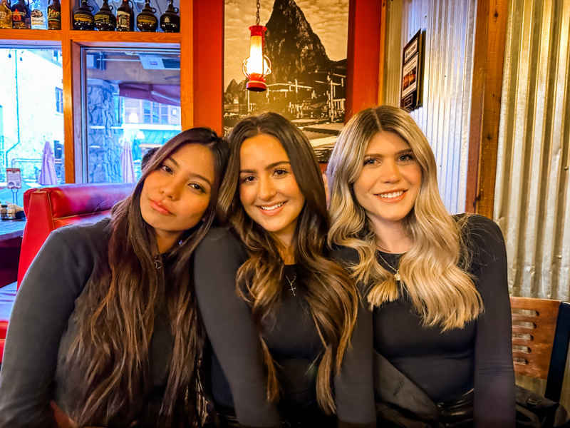 Three girls out celebrating a 21st birthday.