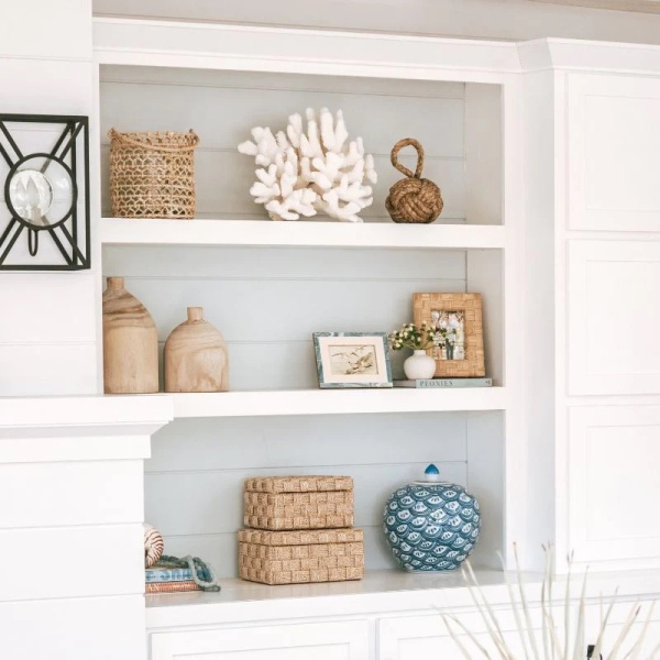 Shelves decorated in coastal style.