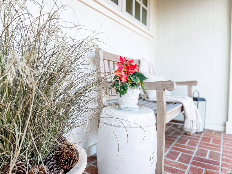 Front porch decorated for Christmas.